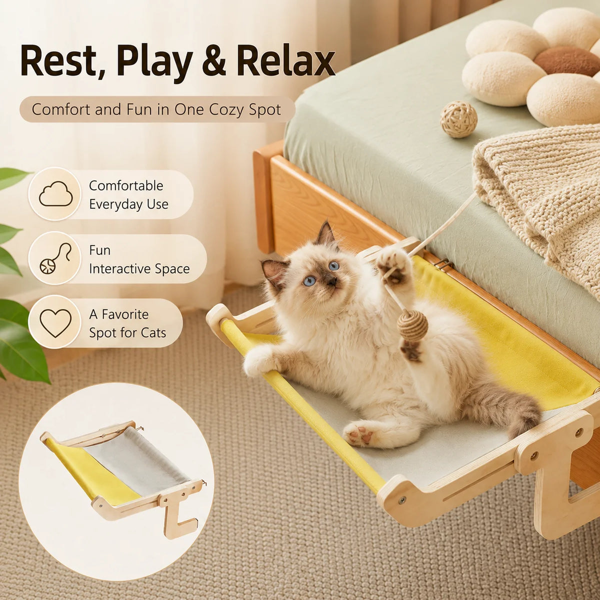 Ragdoll cat playing in a wooden bedside cat hammock with yellow fabric bed